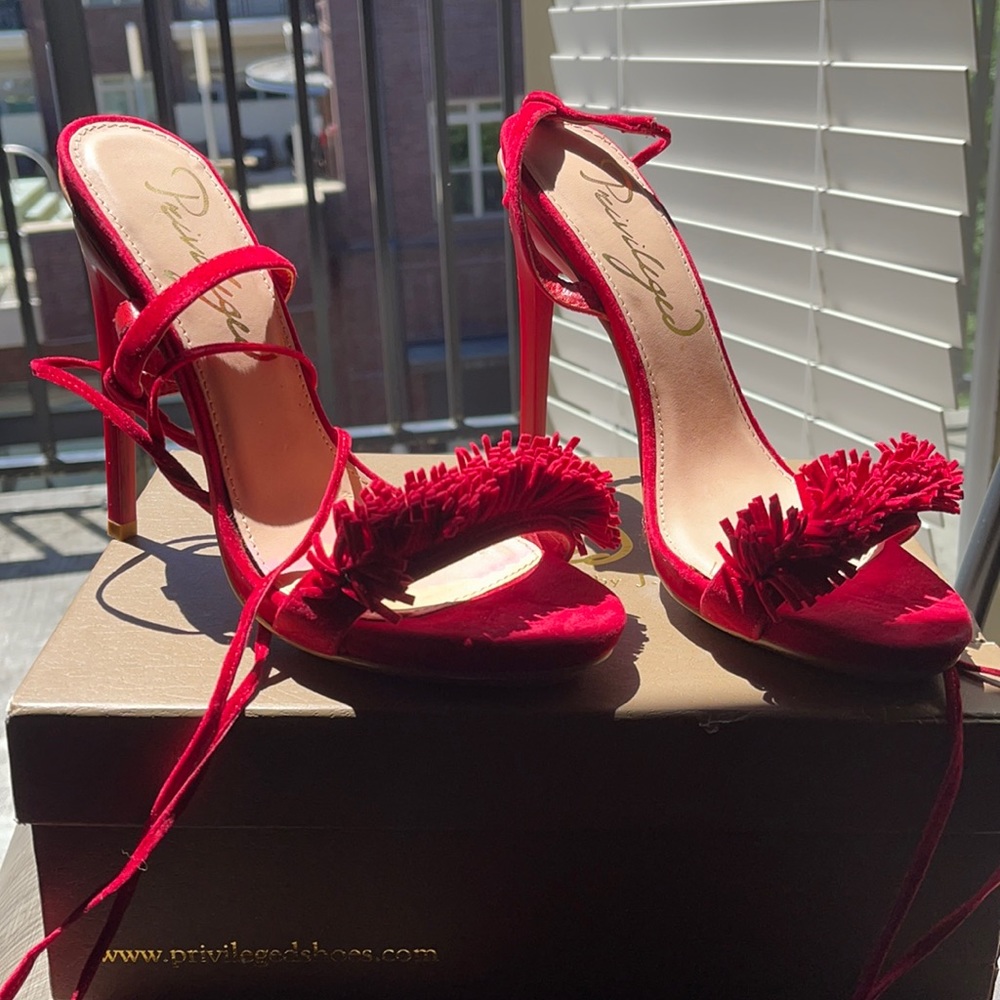 Red lace up fringe heels